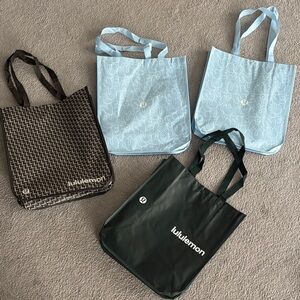 set of lululemon athletica Tote Collection - Black, Blue, and Brown